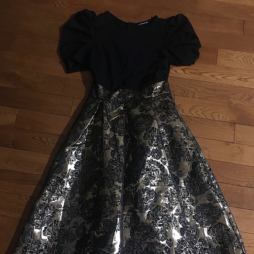 Beautiful black and gold colour dress excellent condition
